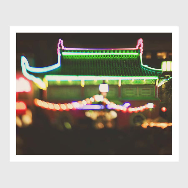Dreamy photo of LA Chinatown at night. Neon lights on a temple.